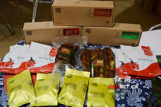 湘西特产抱团亮相食博会 湘军电商引领土特产品新机遇